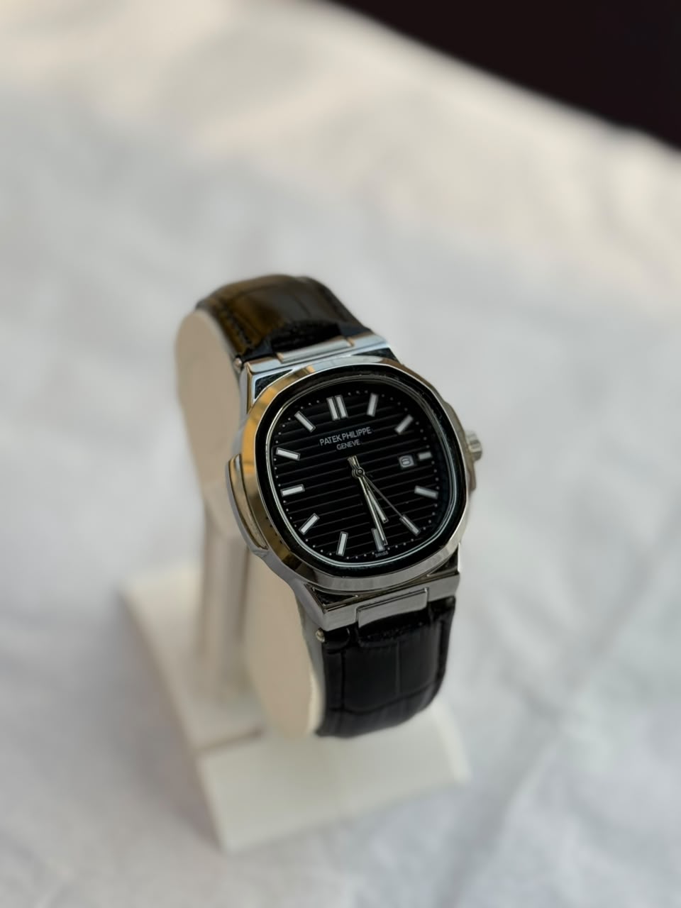 Patek Philippe Nautilus  – White Dial with Black Leather Strap