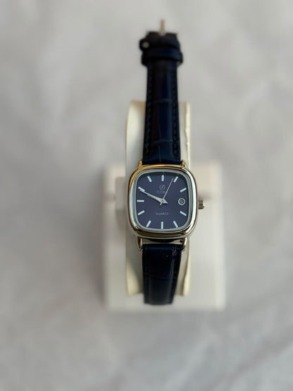 Flora Women’s Blue Dial Leather Strap Watch