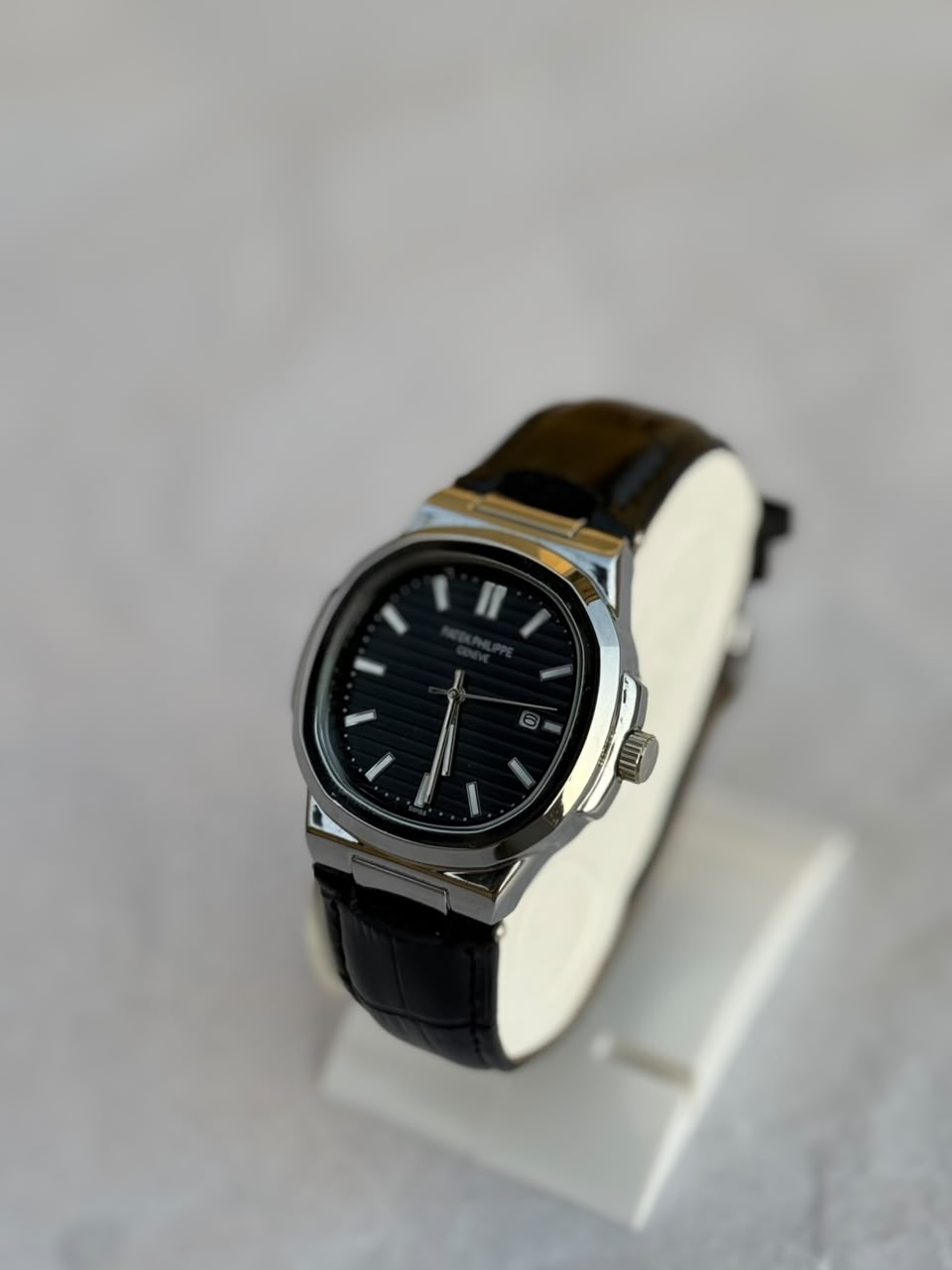 Patek Philippe Nautilus  – White Dial with Black Leather Strap