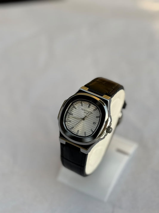 Patek Philippe Nautilus  – White Dial with Black Leather Strap