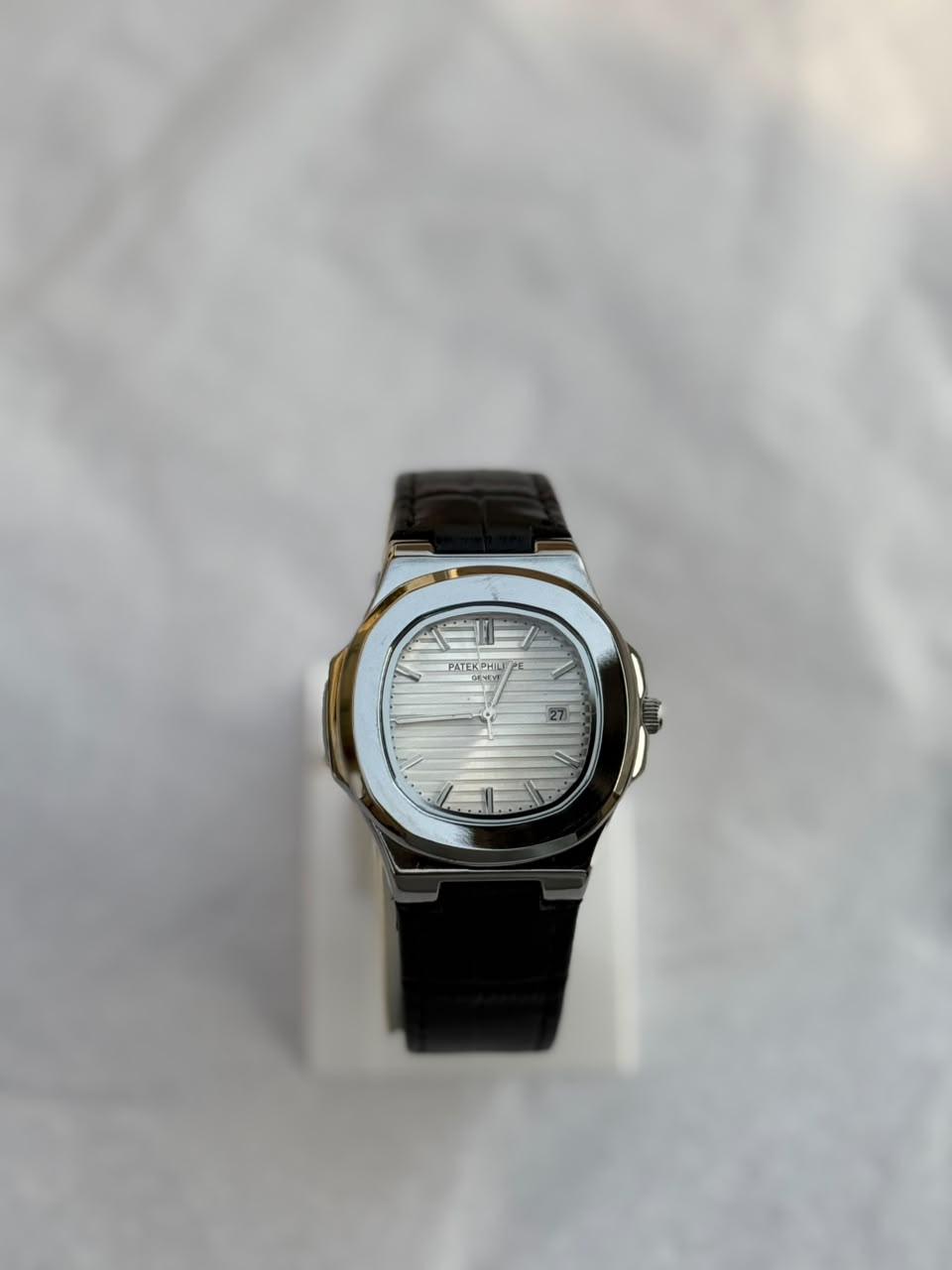 Patek Philippe Nautilus  – White Dial with Black Leather Strap